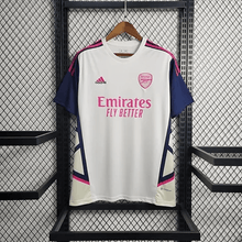 Maillot d'entraînement blanc et rose d'Arsenal 2023/24