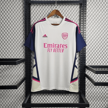 Maillot d'entraînement blanc et rose d'Arsenal 2023/24