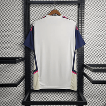 Maillot d'entraînement blanc et rose d'Arsenal 2023/24