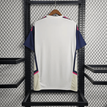 Maillot d'entraînement blanc et rose d'Arsenal 2023/24